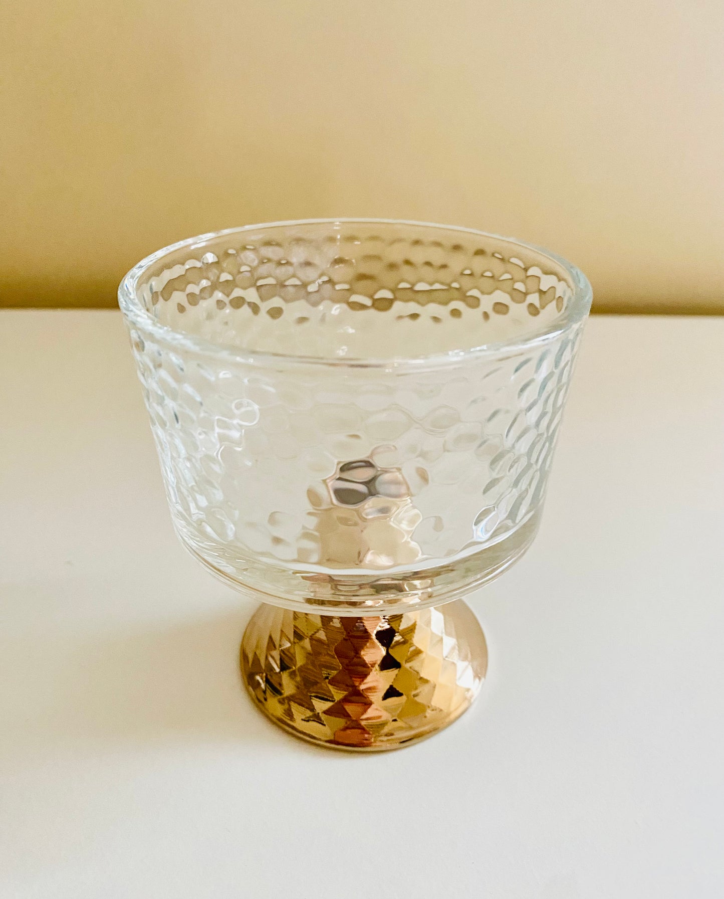 Round glass cup.