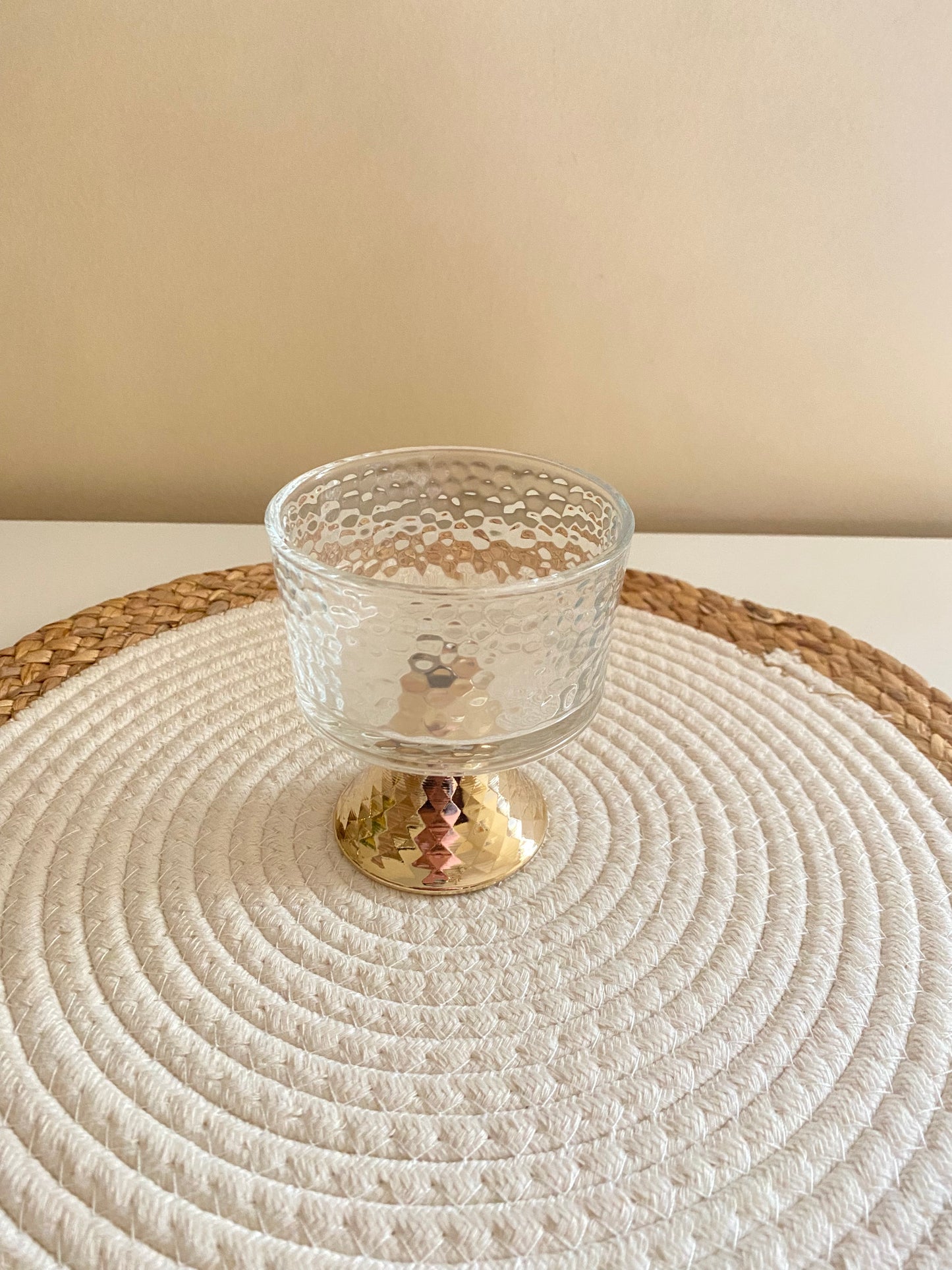 Round glass cup.