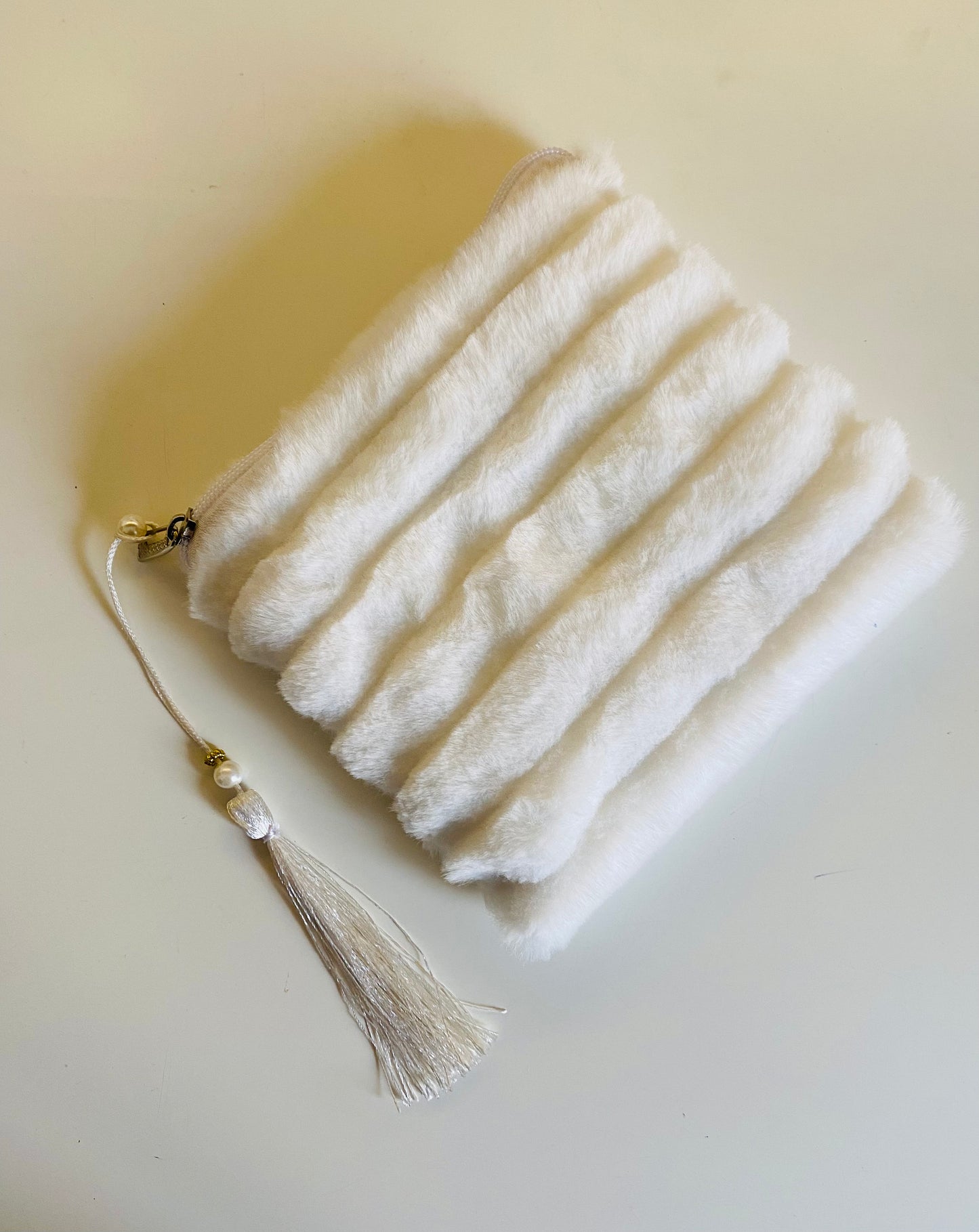 Fur make-up bag