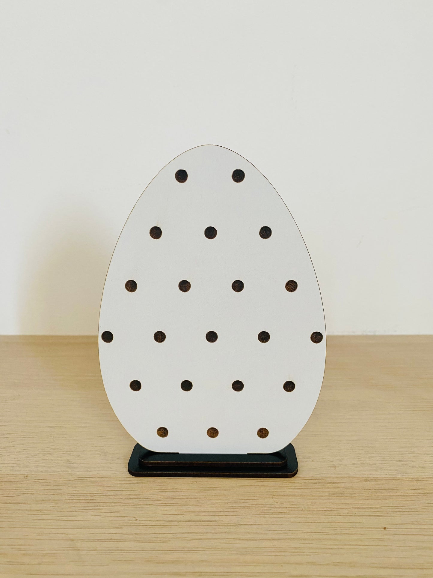 Wooden standing egg